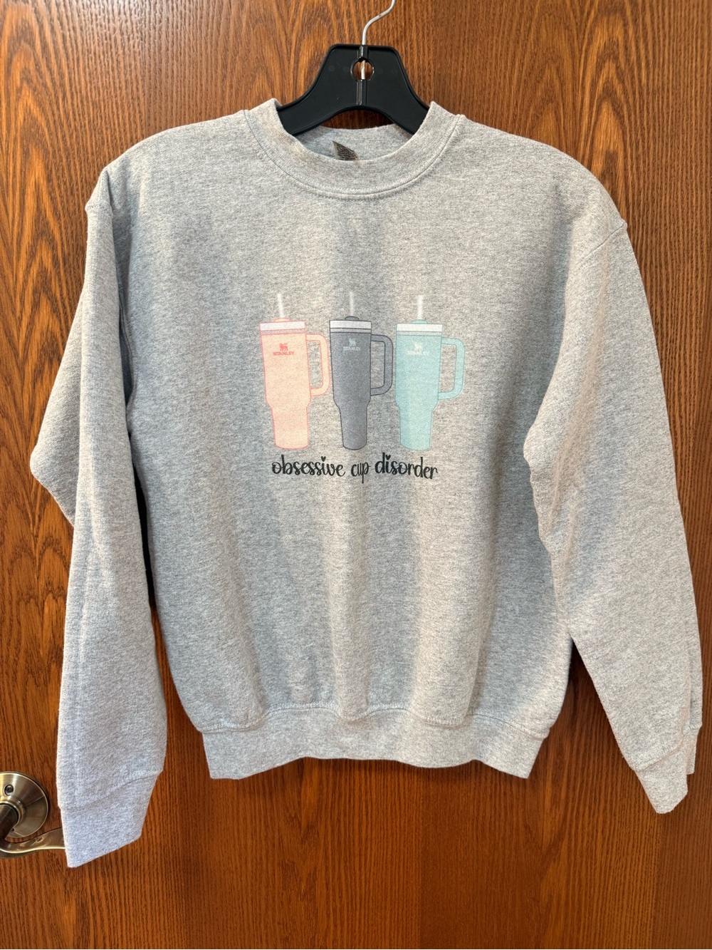 Gildan Heather Gray Sweatshirt with Pink, Gray, and Mint Stanley Cup Graphic